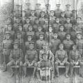 No5 Platoon, 128th Battalion.  George Ridgeway seated 5th row from the front, second from the left.