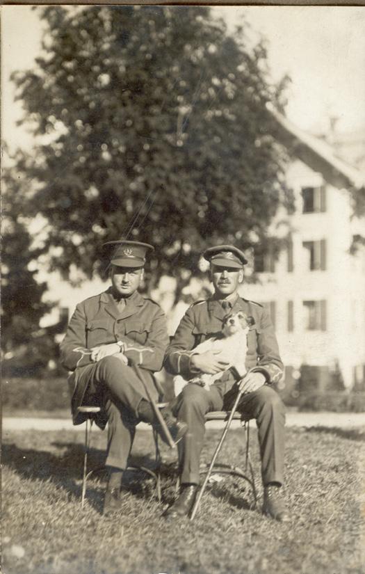 Two officers with dog, Mürren Prisoner of War camp, Switzerland, 1916/1917, WWI